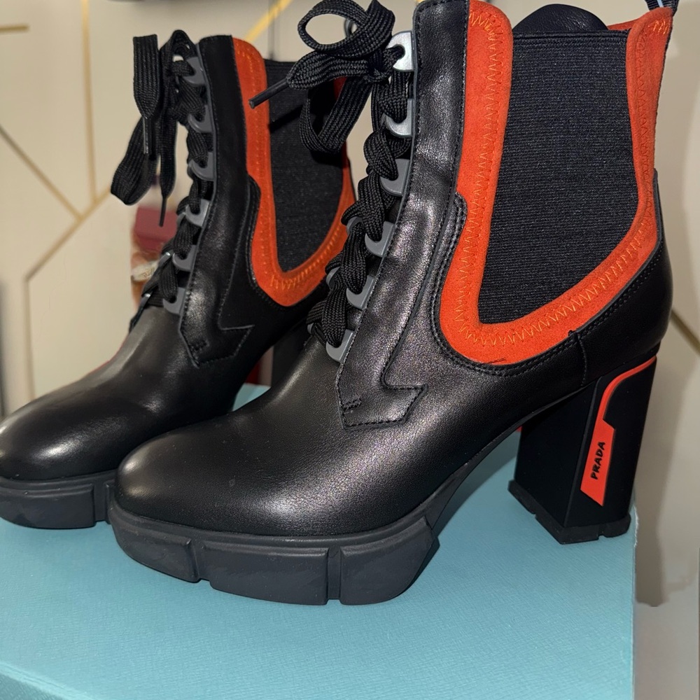 Prada Black Leather Ankle Boots with Orange Trim